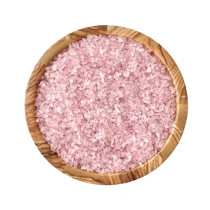 Small pink rose quartz chips in a round dish